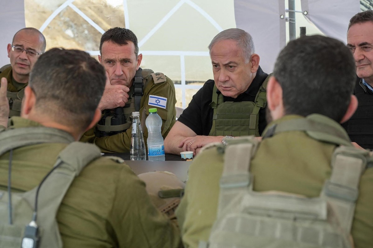 Israel's Prime Minister Benjamin Netanyahu (R), Defence Minister Israel Katz (R) and army Chief-of-Staff Herzi Halevi (2nd L) during a briefing in the Netzarim Corridor, on November 19, 2024. (File/AFP)