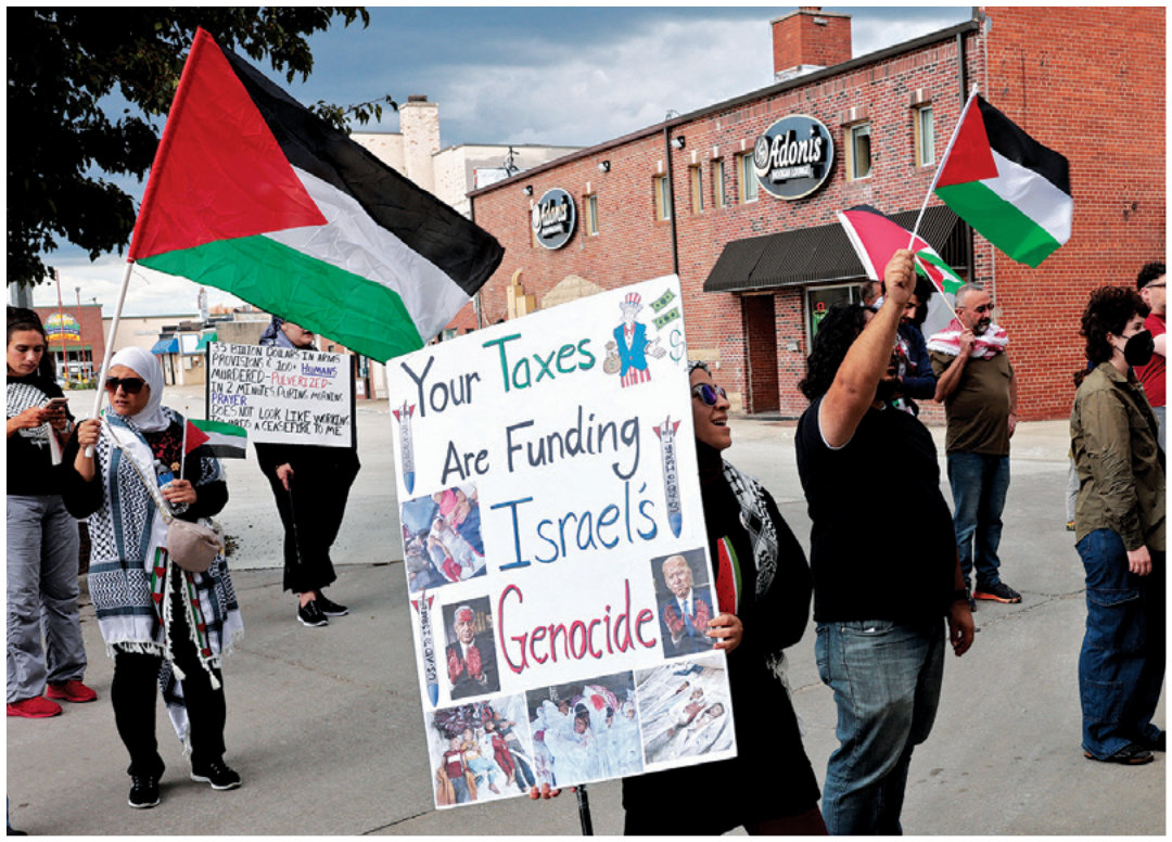 Pro-Palestinian demonstrators protest in support of the Palestinians who have died in Gaza outside of the Arab American National Museum in Dearborn, Michigan, on August 11, 2024. (AFP)
