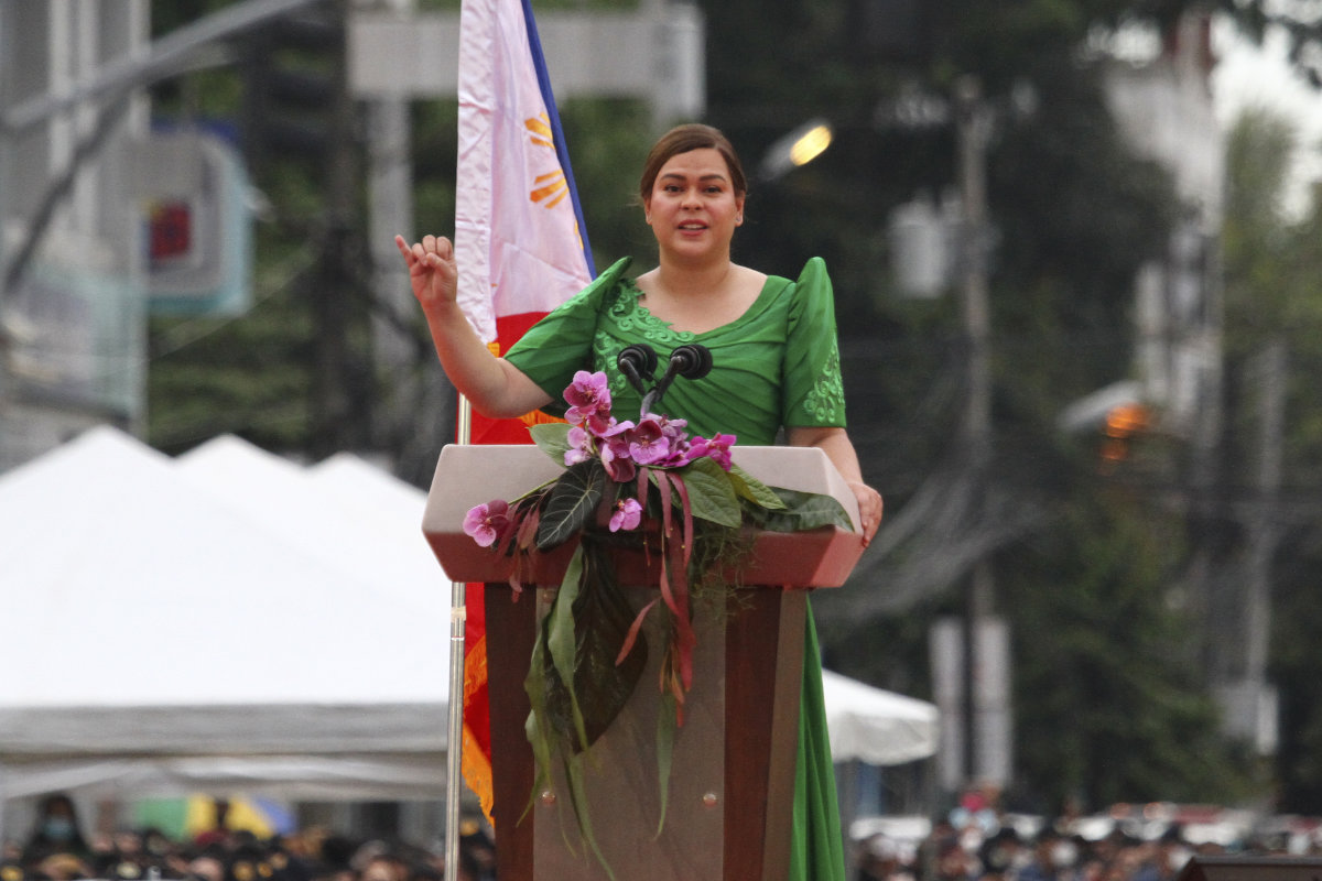 Philippine Vice President-elect Sara Duterte, daughter of outgoing populist president of the Philippines, delivers her speech during her oath-taking rites in her hometown in Davao city, southern Philippines, on June 19, 2022. (AP)