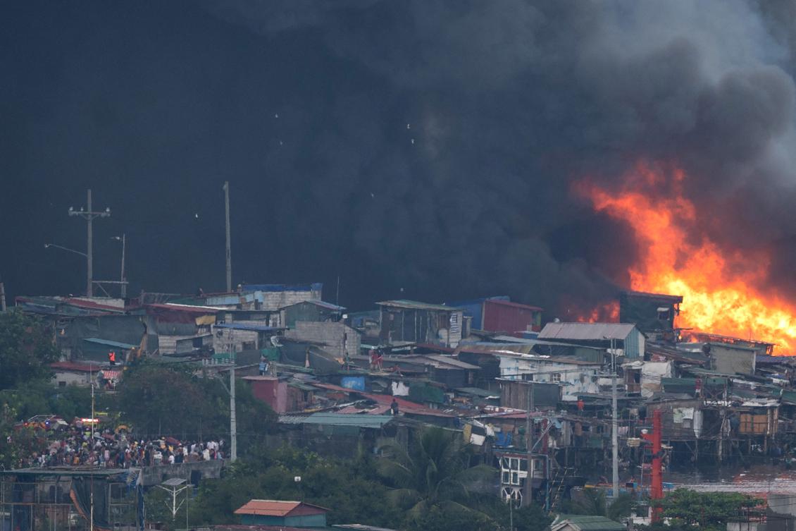 Manila Fire District said around 1,000 houses were burned in the blaze that is thought to have started on the second floor of one of the homes. (AFP)