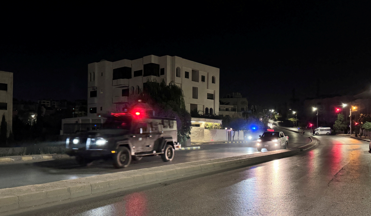 Police vehicles on a street near the Israeli embassy in Amman, Jordan November 24, 2024. (REUTERS)