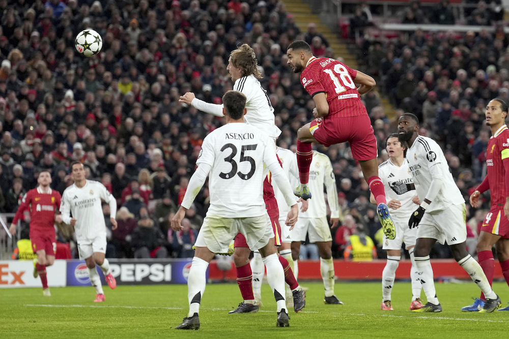 Liverpool’s Cody Gakpo, center, scores his side’s second goal and game clincher during the Champions League opening match between Liverpool and Real Madrid at Anfield Stadium, Liverpool, England, Wednesday. (AP)