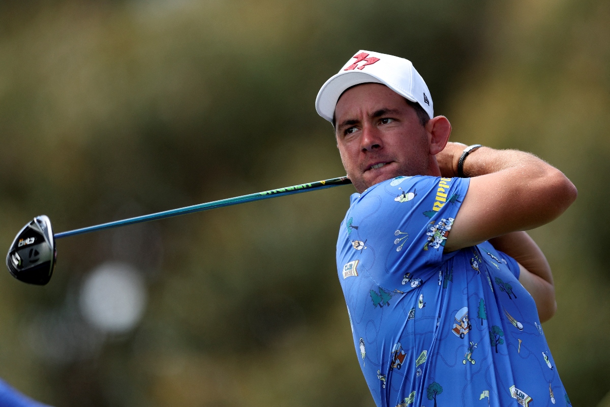 Lucas Herbert of Australia tees off during the first round of the 2024 ISPS Handa Australian Open Golf tournament at the Victoria Golf Club in Melbourne on Nov. 28, 2024. (AFP)
