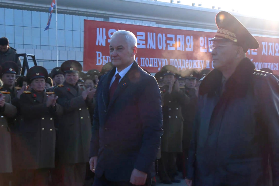 Russian Defense Minister Andrei Belousov, left, is welcomed by his North Korean counterpart No Kwang Chol upon his arrival in North Korea on Nov. 29, 2024. (Russian Defense Press Service via AP)