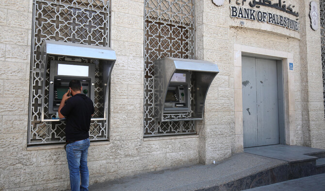 Israel extended for one year a waiver allowing Israeli banks to work with Palestinian ones just days before it was due to expire, threatening to paralyse Palestinians financial institutions. (AFP/File)