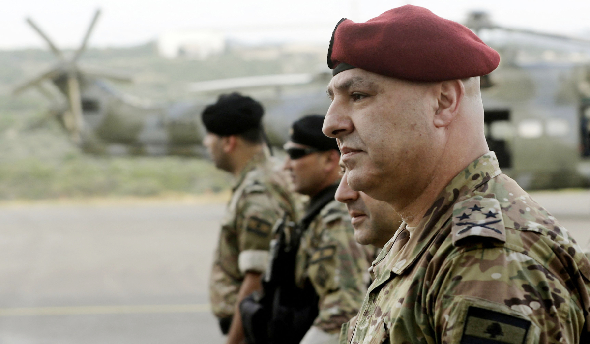 General Joseph Aoun (R), the Lebanese Army Chief of Staff, arrives to attend a handover ceremony organised by the Lebanese Armed Forces of four A-29 Super Tucano aircraft given by the US at Hamat airbase, north of Beirut on June 12, 2018. (AFP file photo)