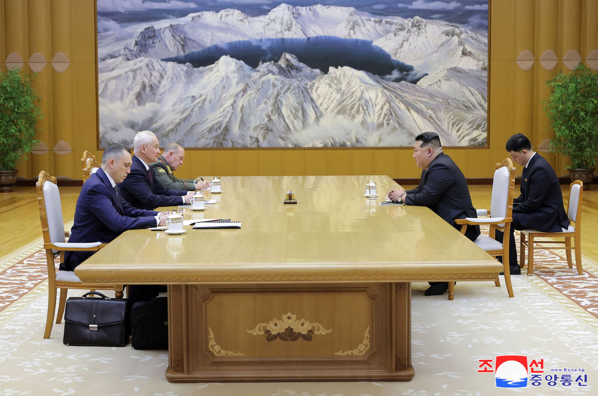 This picture taken on Nov. 29, 2024, shows North Korean leader Kim Jong Un (R) meeting with Russia's Minister of Defense Andrei Belousov (2nd L) in Pyongyang. (KCNA VIA KNS / AFP)