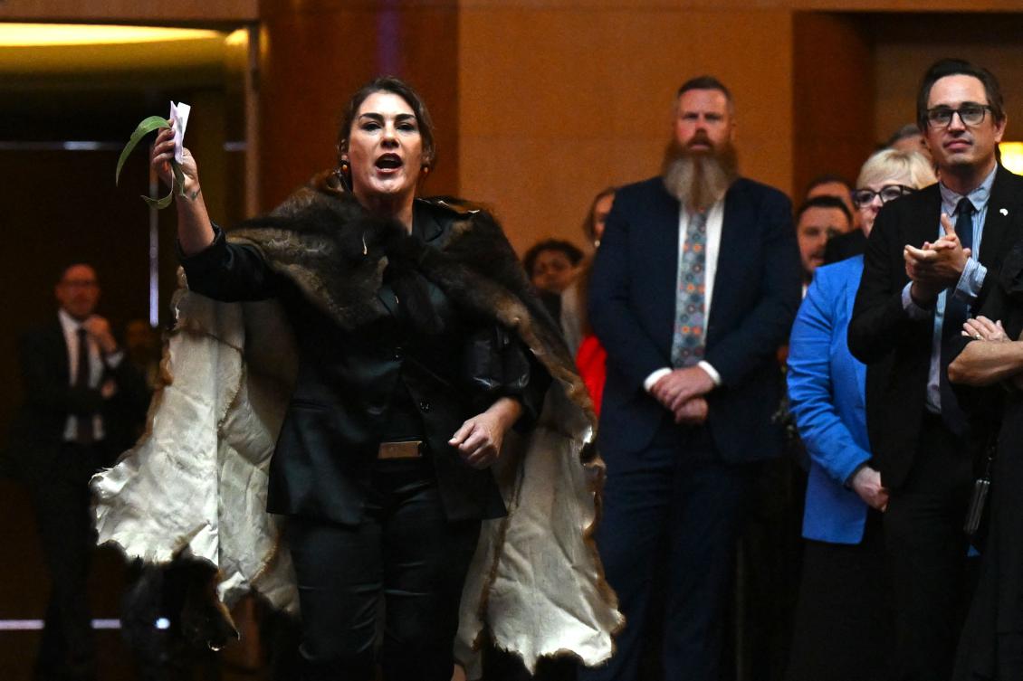 Above, Senator Lidia Thorpe disrupts proceedings as Britain’s King Charles III and Queen Camilla attend a Parliamentary reception at Parliament House in Canberra on Oct. 21, 2024. (AFP)
