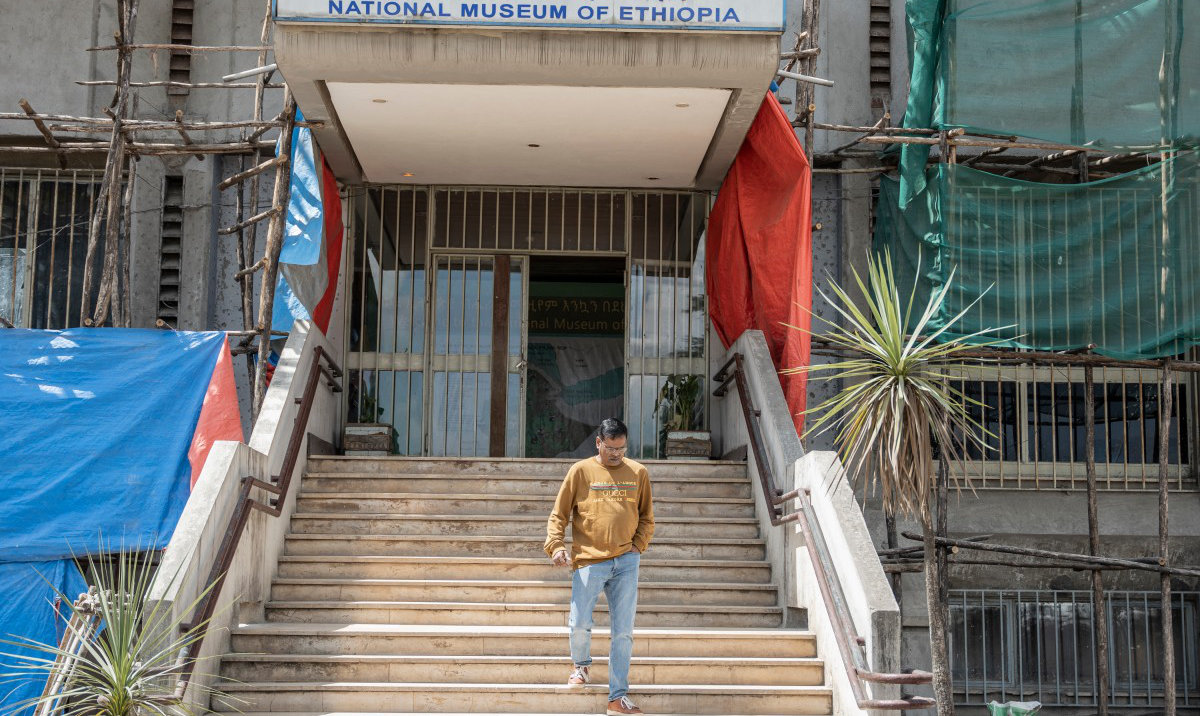 A visitor exits the National Museum of Ethiopia in Addis Ababa, on November 19, 2024. (AFP)
