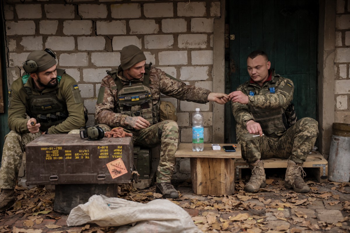 Ukrainian servicemen of the 24th Mechanized Brigade rest in a shelter at an undisclosed location (AFP)