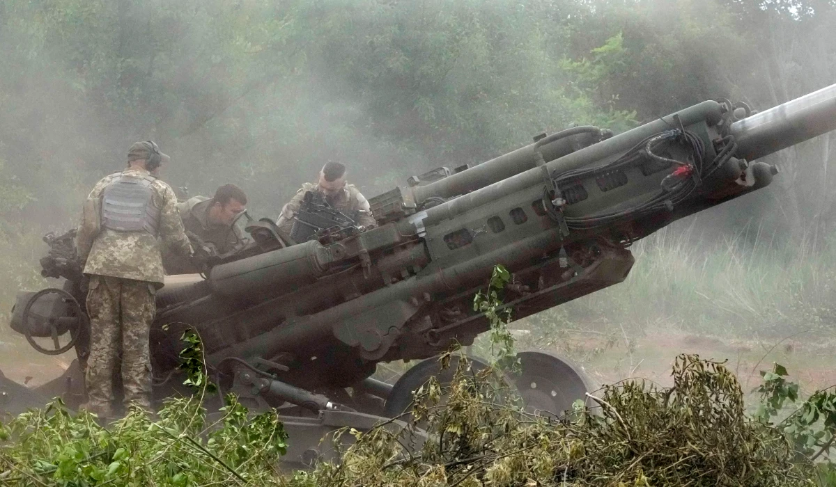 Ukrainian soldiers prepare to fire at Russian positions from a US-supplied M777 howitzer in Ukraine's Donetsk region. (AP)
