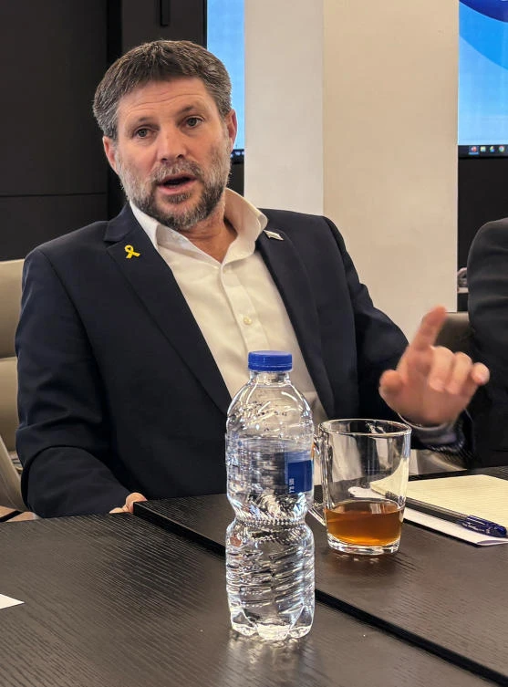 Israeli Finance Minister Bezalel Smotrich speaks during a press conference with finance ministry officials ahead of the 2025 budget vote, at Israel's Finance Ministry in Jerusalem. (Reuters)