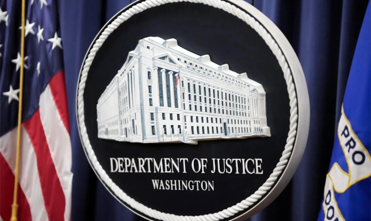 The logo for the Justice Department is seen before a news conference at the Department of Justice, in Washington. (AP/File)