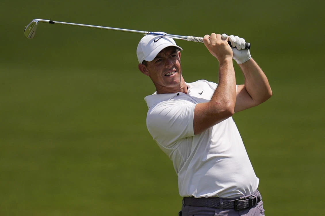 The No. 3-ranked McIlroy said he has been locked in a studio for three weeks just hitting balls at a screen with a modified swing. (AP)