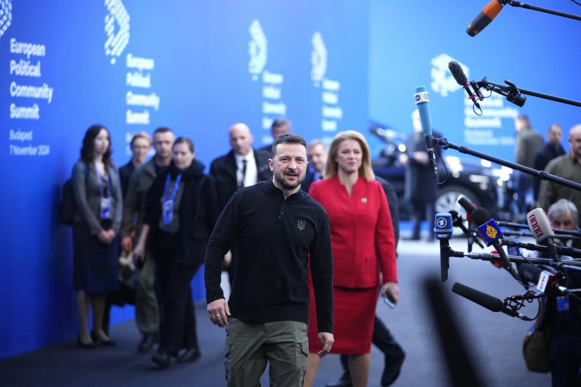 Ukraine’s President Volodymyr Zelensky, center, arrives for the European Political Community (EPC) Summit at the Puskas Arena in Budapest, Nov. 7, 2024. (AP)