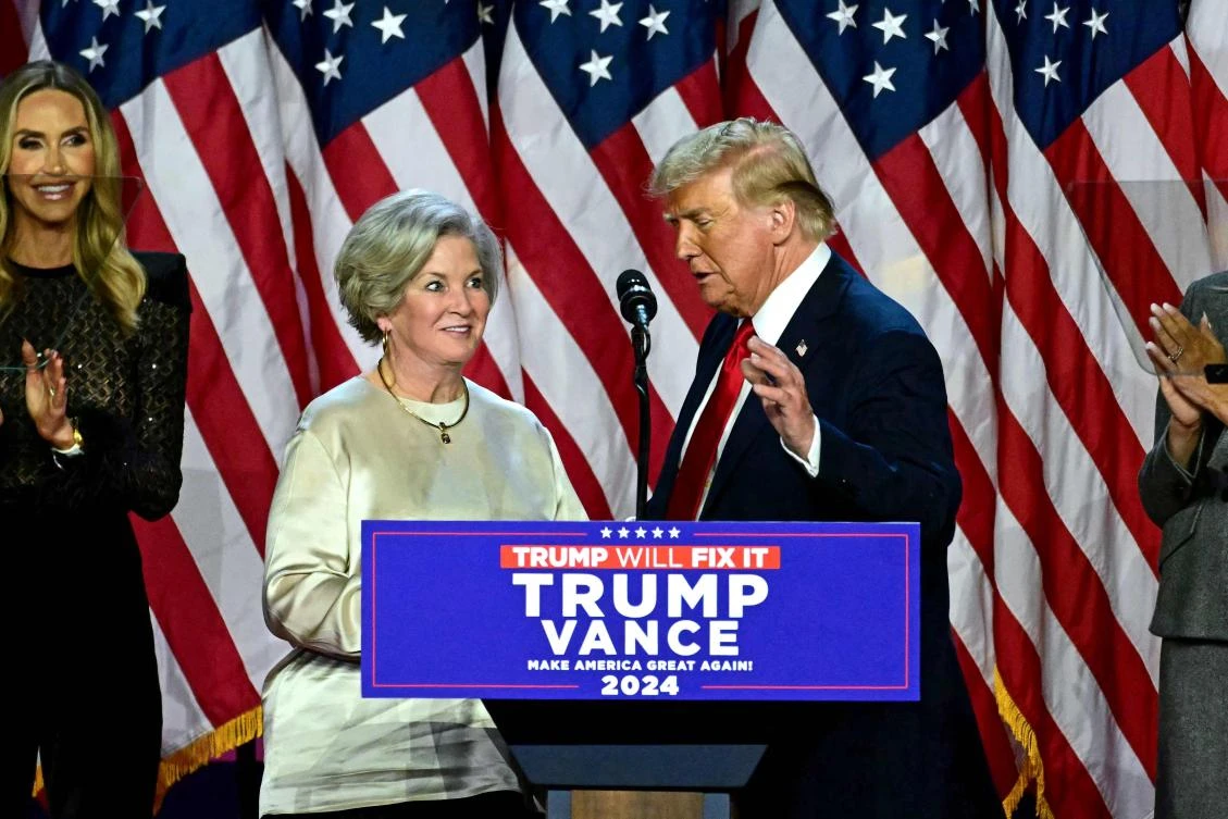 Trump makes first cabinet pick, eyes Putin talks