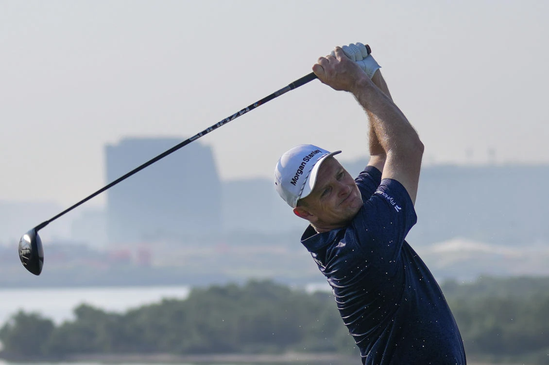 Justin Rose of England tees off at third hole during the second round of Abu Dhabi Golf Championship in Abu Dhabi, on Nov. 8, 2024. (AP)