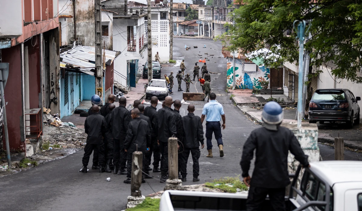 Comoros Police officers and Comoros soldiers patrol in Moroni on January 17, 2024. (AFP)