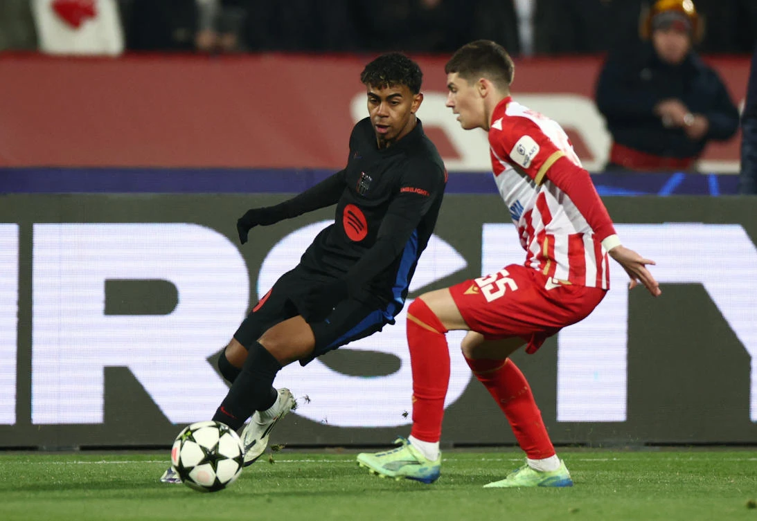 FC Barcelona’s Lamine Yamal in action with Crvena Zvezda’s Andrija Maksimovic during their Champions League match at Rajko Mitic Stadium, Belgrade, on Nov. 6, 2024. (Reuters)