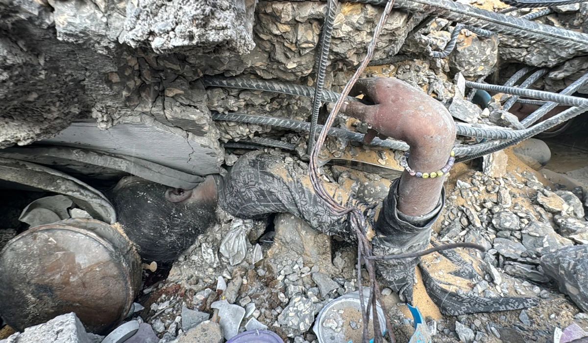 A young Palestinian victim lies amid the collapsed walls of her family home that was hit in an Israeli strike in the Jabalia refugee camp in the northern Gaza Strip, on November 7, 2024. (AFP)