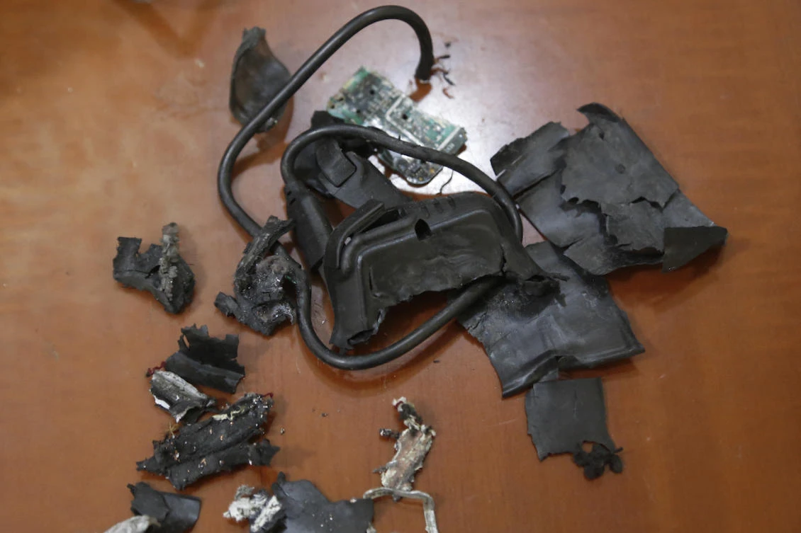 A photo taken on September 18, 2024, in Beirut’s southern suburbs shows the remains of exploded pagers on display at an undisclosed location. (File/AFP)
