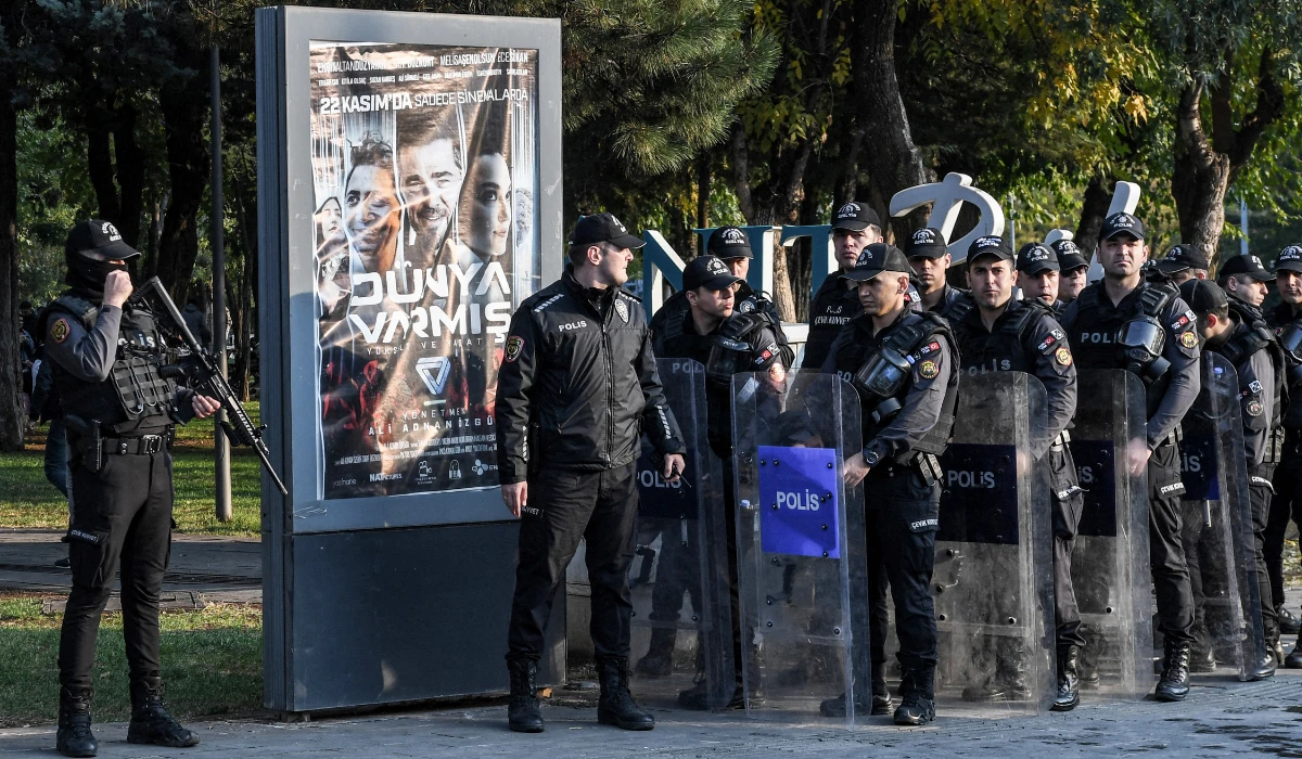 Turkish anti-riot police officers stand guard as protesters gathering against trustees during a demonstration in Diyarbakir, on November 4, 2024. (AFP)