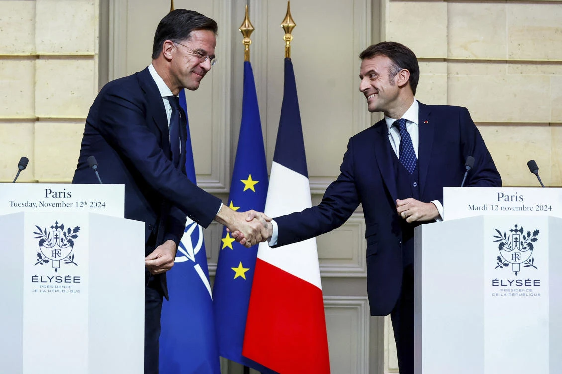 French President Emmanuel Macron and NATO Secretary General Mark Rutte shake hands during their meeting at the Elysee Palace, in Paris, on Nov. 12, 2024. ()