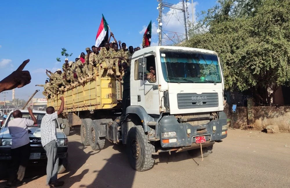 Sudanese Armed Forces’ soldiers are transported by truck through Gedaref, Sudan, Nov. 11, 2024. (AFP)