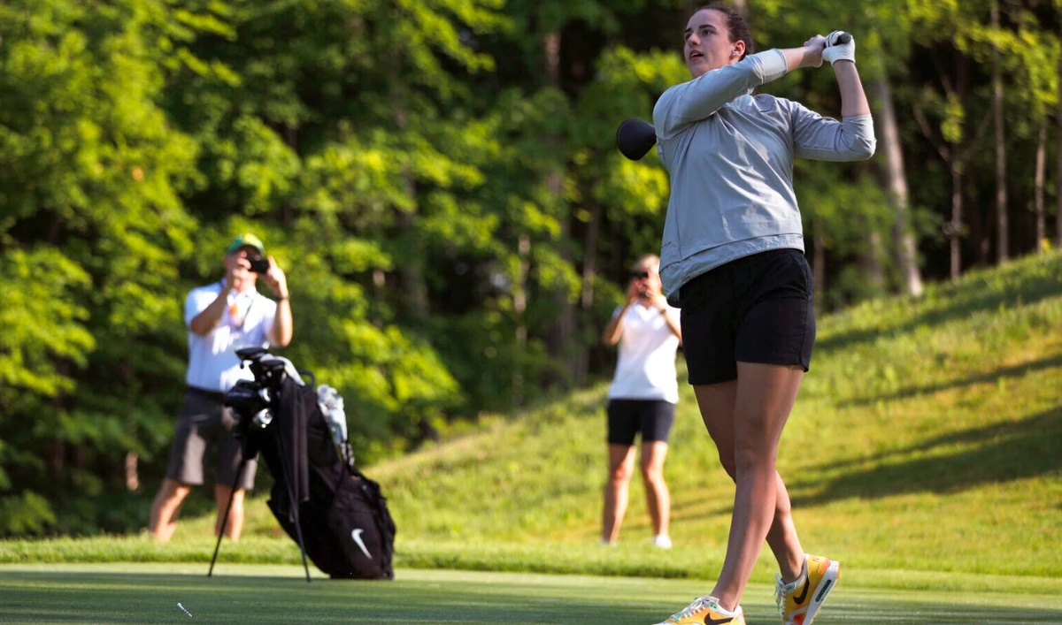 Caitlin Clark hits a golf ball during the John Deere Classic Pro-Am, July 5, 2023, at TPC Deere Run in Silvis, Illinois. (AP)