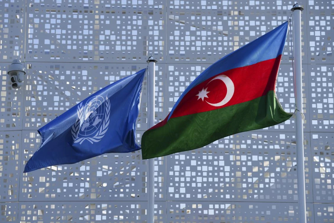 A fresh draft of a UN climate deal released Wednesday proposes concrete options to raise funding for poorer countries. (AP)