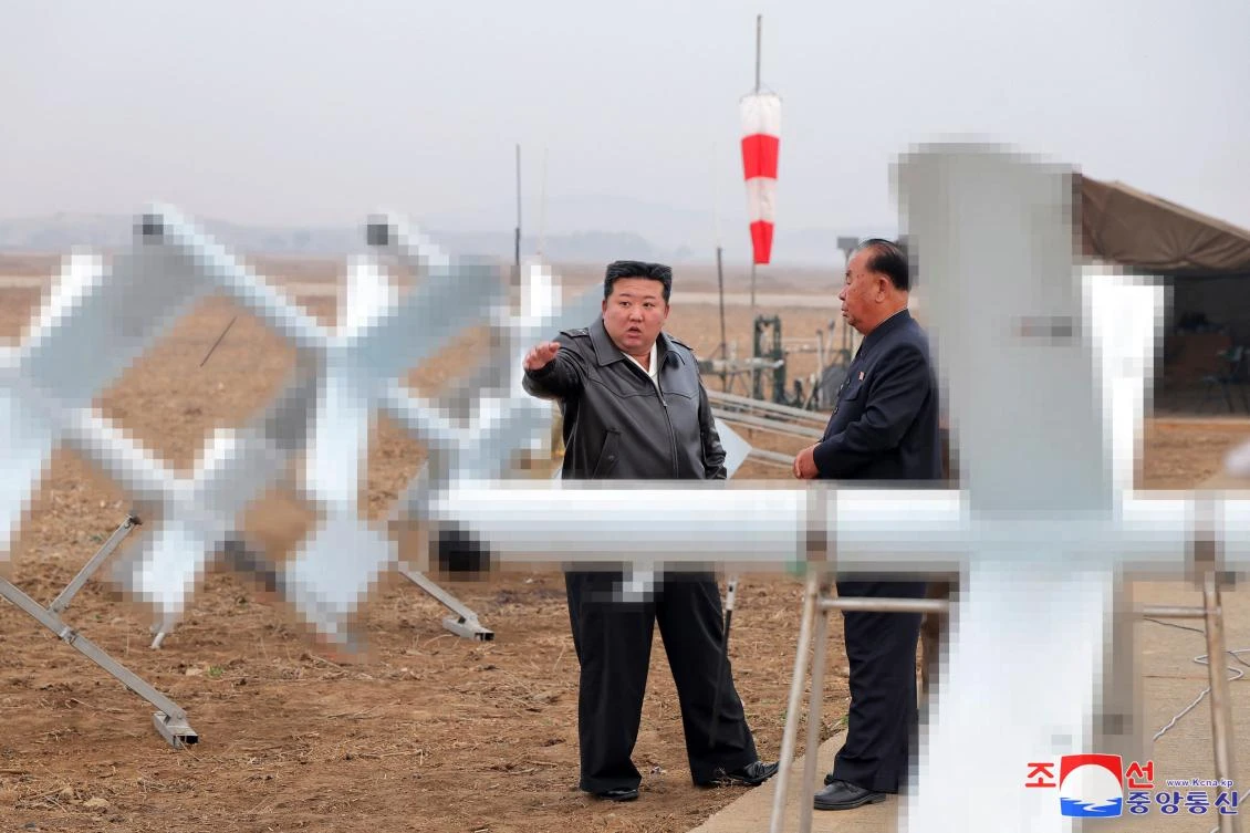 North Korean leader Kim Jong Un inspects the performance test of suicide attack drones at an undisclosed location in North Korea in this picture released on Nov. 15, 2024. (KCNA via KNS/AFP)