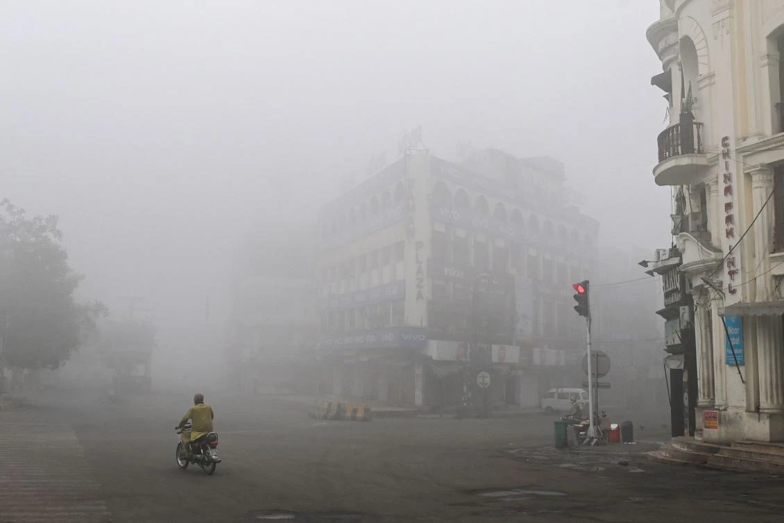 The dangerous smog is a byproduct of large numbers of vehicles, construction and industrial work as well as burning crops at the start of the winter wheat-planting season, experts say. (AFP)