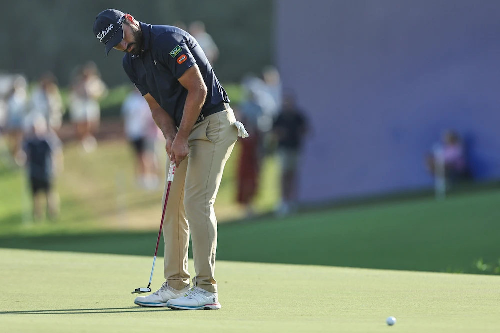 The Frenchman, who has a good record in Dubai, leads by one on nine under par with a stacked leaderboard in pursuit. (AFP)