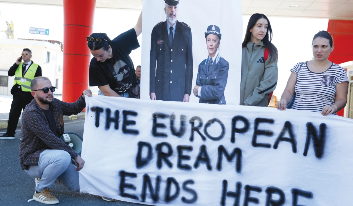 Activists stage a demonstration in Shengjin, Albania. (Reuters)