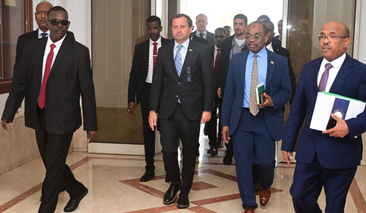 US Special Envoy for Sudan Tom Perriello (C) is welcomed by local officials upon his arrival in Port Sudan on November 18, 2024. (AFP)