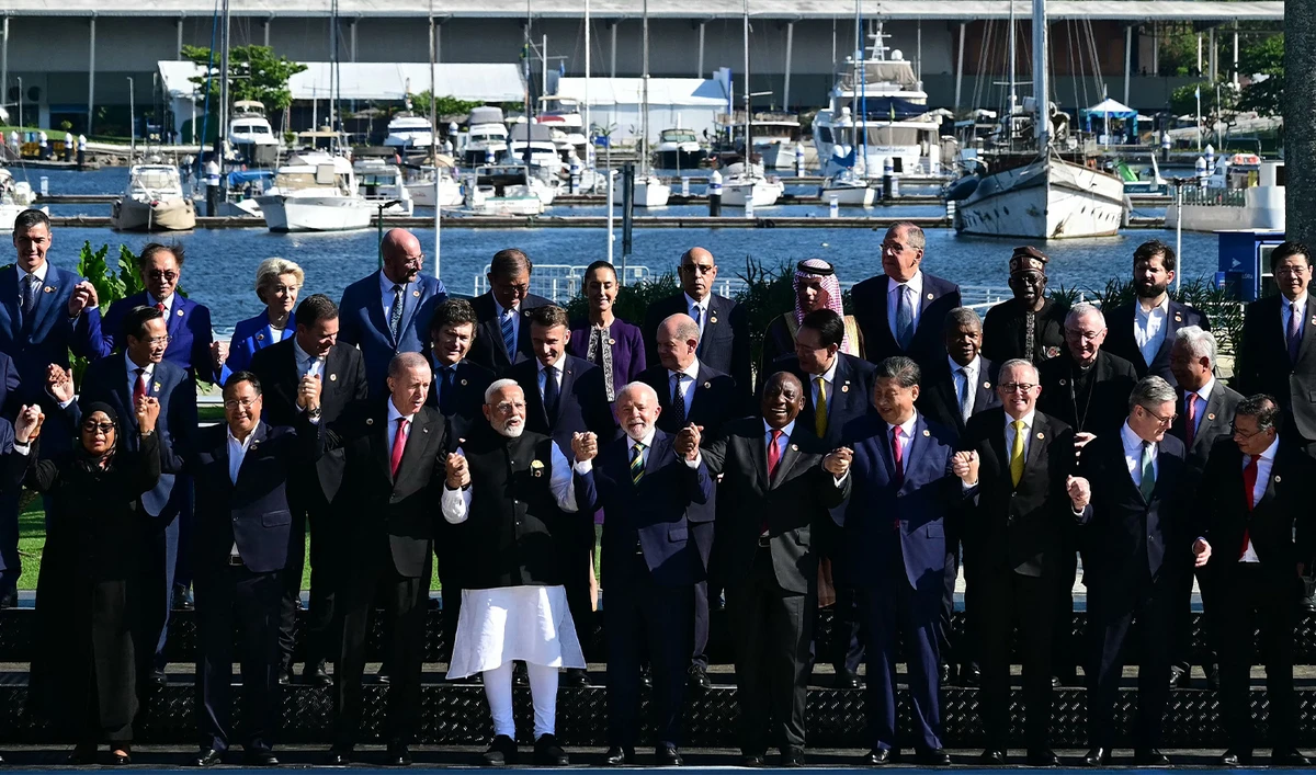 Leaders attending the launch of the Global Alliance Against Hunger and Poverty pose for a group photo after the first session of the G20 Leaders' Meeting in Rio de Janeiro, Brazil, on November 18, 2024. (AFP)