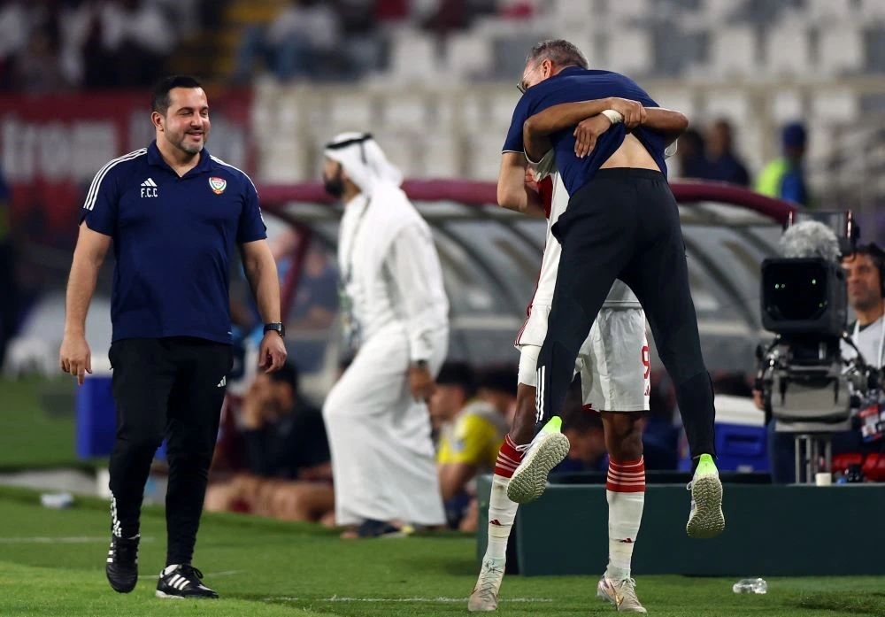 Paulo Bento celebrates with Harib Abdalla after defeating Qatar at Al-Nahyan Stadium, Abu Dhabi, United Arab Emirates, November 19, 2024. (Reuters)