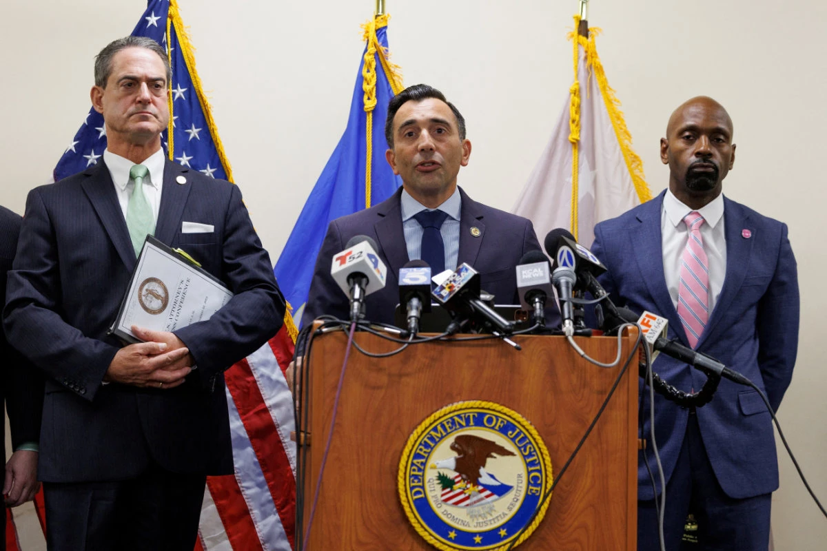 US Attorney Martin Estrada, flanked by Orange County District Attorney Todd Spitzer and FBI Special Agent in Charge Ted Docks, at the Ronald Reagan Federal building in Santa Ana, California, on Oct. 22, 2024. (REUTERS)