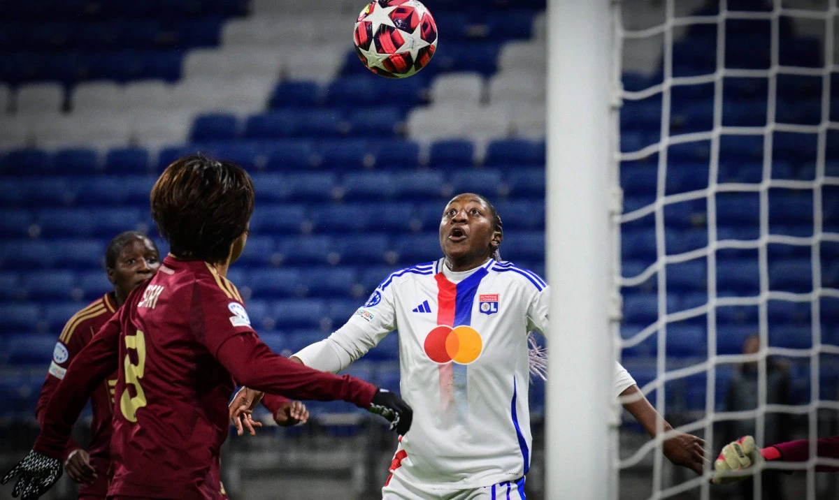 Lyon’s French forward Kadidiatou Diani (R) heads the ball to score her team’s second goal during their UEFA Women’s Champions League Group A football match against AS Roma at the Parc Olympique Lyonnais in Decines-Charpieu, central-eastern France on Nov. 20, 2024. (AFP)
