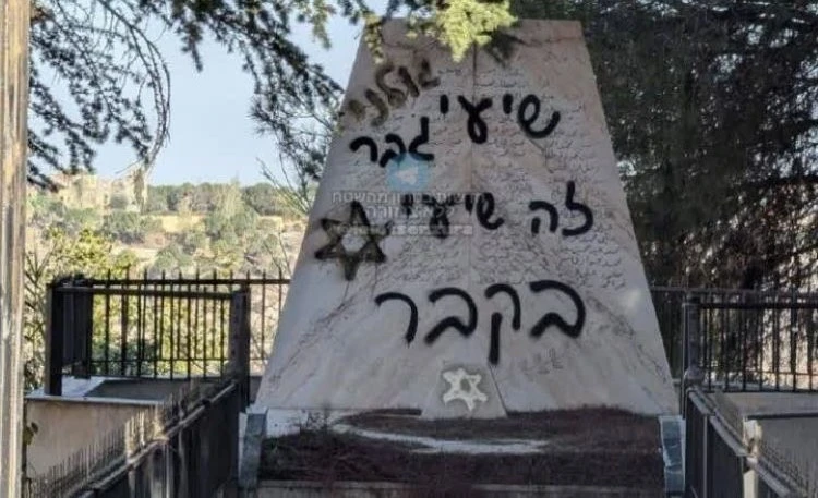 The defaced Lebanese war memorial in Hula. (X/@HalaJaber)