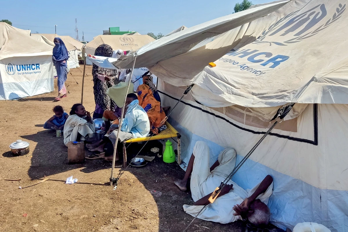 Sudanese people who fled escalating violence in the Al-Jazira state rest at a camp for the displaced in the eastern city of Gedaref on November 23, 2024. (AFP)