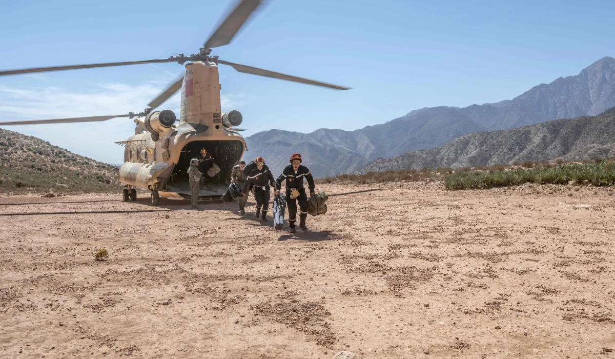 Emergency personnel disembark from a helicopter to support rescue operations in the mountainous area of Tizi N'Test, in the Taroudant province, one of the most devastated in quake-hit Morocco, on September 11, 2023. (AFP)