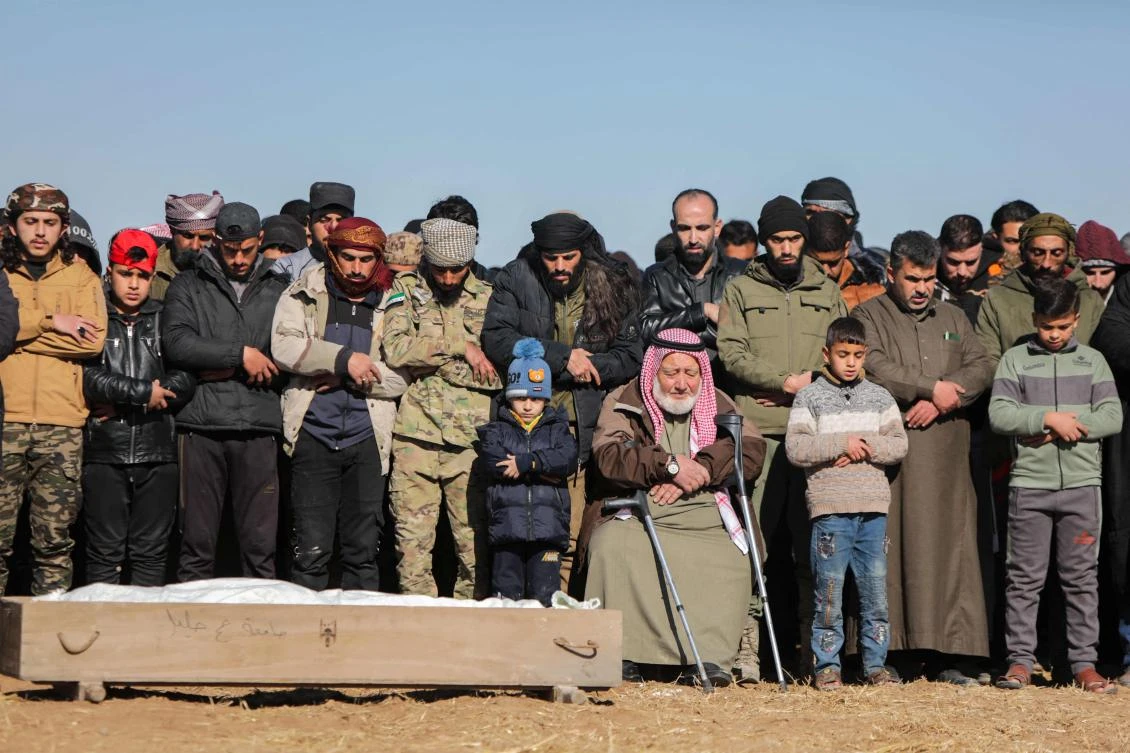 A mass funeral for members of a Turkish-backed Syrian faction who were killed in overnight clashes with Kurdish militants in Syria’s northern Al-Bab city, Nov. 25, 2024 (AFP)