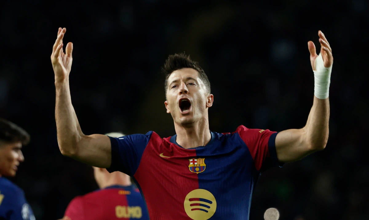 Barcelona's Robert Lewandowski celebrates after scoring his team's first goal during a Champions League phase soccer Matchday 5 between Barcelona and Brest at the Lluis Companys Olympic Stadium in Barcelona, Spain, Tuesday, Nov. 26, 2024. (AP)