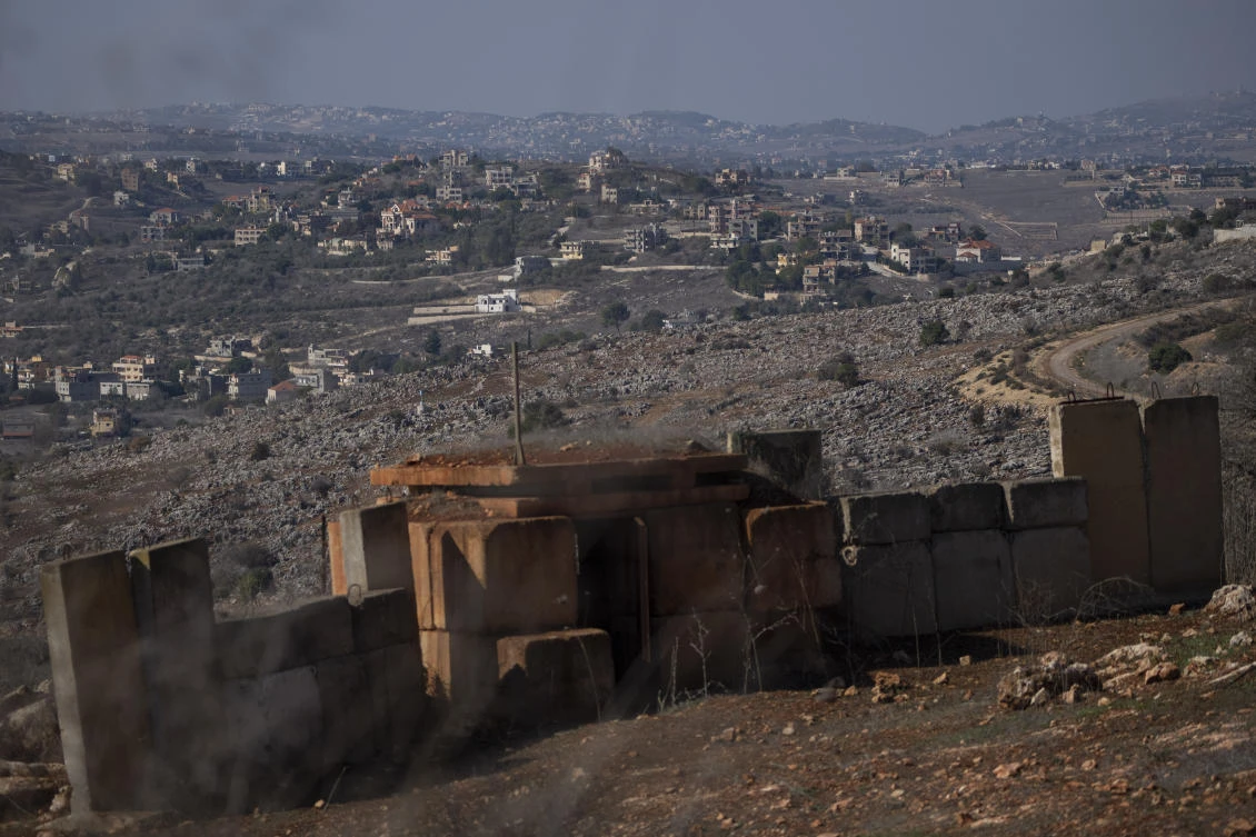 Backdropped by a Lebanese village an Israeli army position sits near the Israeli-Lebanese border, during the ceasefire between Israel and Hezbollah, as seen from the northern Israel, Nov. 30, 2024. (AP)