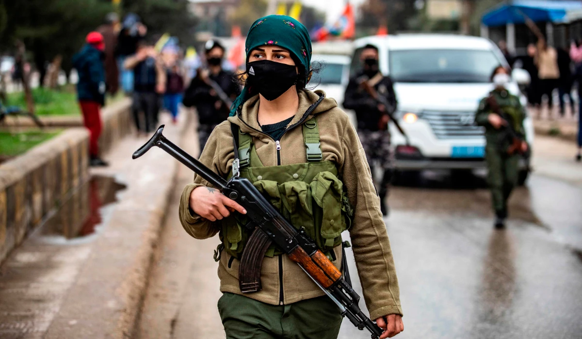 A member of the Kurdish security stands guard in Afrin. (AFP)