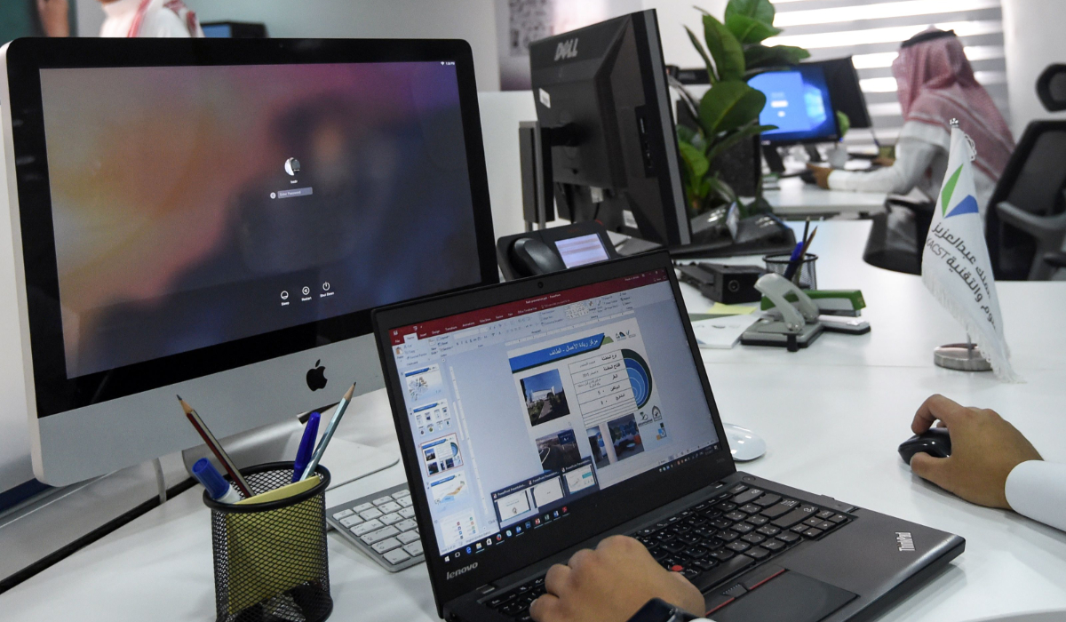A Saudi employee using a laptop to prepare a slideshow at his office in the capital Riyadh. (AFP)