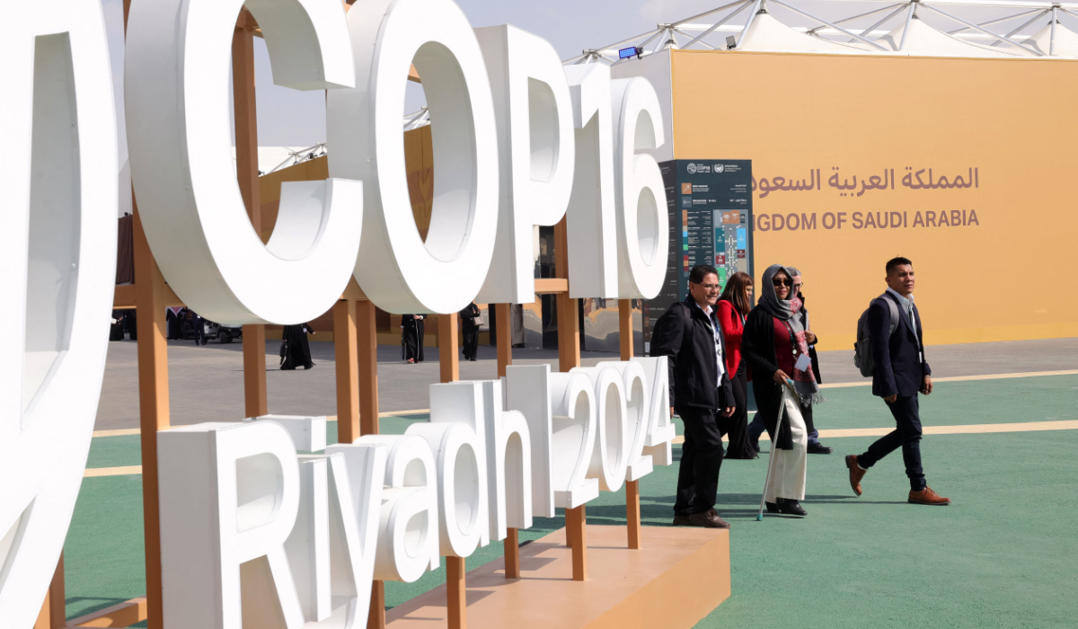 Delegates arrive for the opening session of the UN Convention to Combat Desertification, UNCCD COP16, in Riyadh. (AFP)