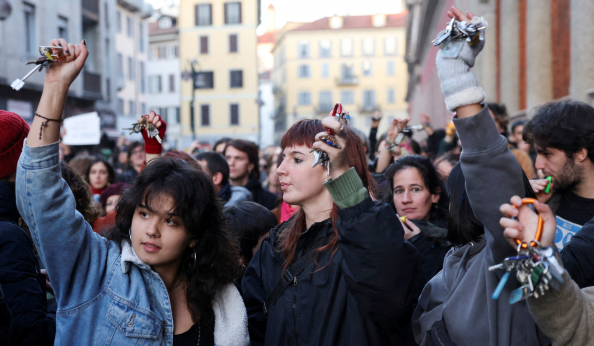 Students perform a flash mob to protest against feminicide and violence against women in Milan, Italy. (REUTERS)