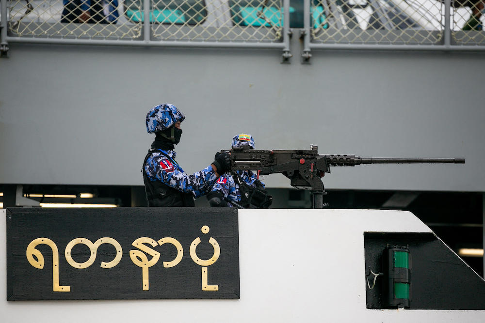 The Thai defense ministry earlier said two of 15 Thai fishing vessels were fired on by Myanmar’s navy. Above, a member of the Myanmar navy in Yangon on Oct. 6, 2021. (AFp file photo)